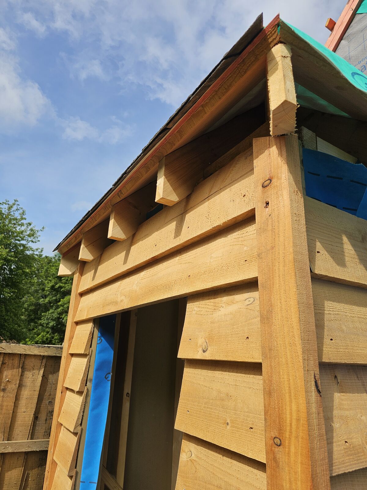 Sawn rafters seated on the oak wall plate with ends left exposed